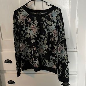 Black with roses sweater. Loved a lot but it great condition, no snags or stains